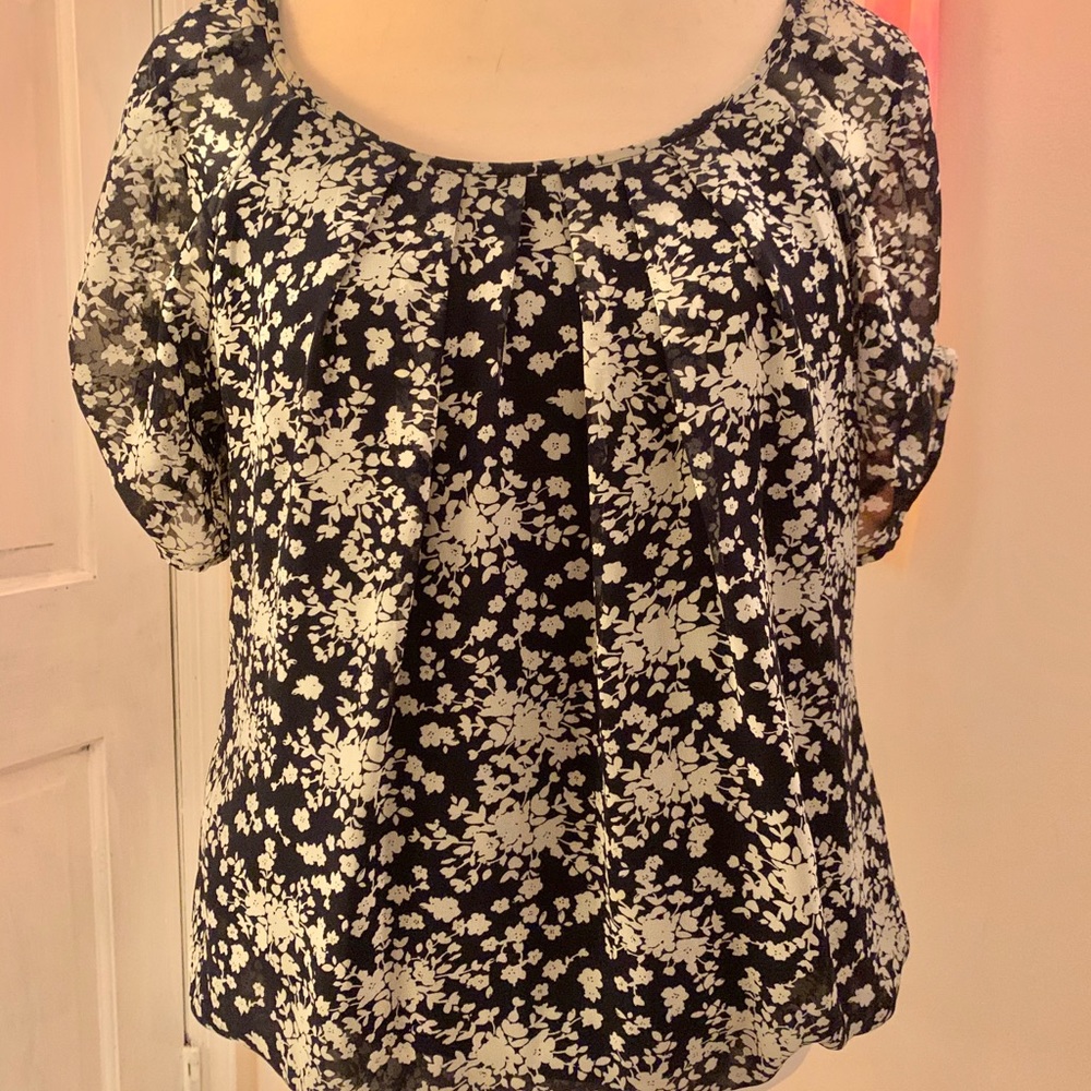 Navy blue blouse with white flowers